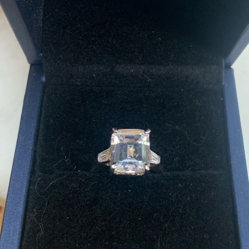 Italo 3 carat Emerald cut 3 stone white Sapphire ring